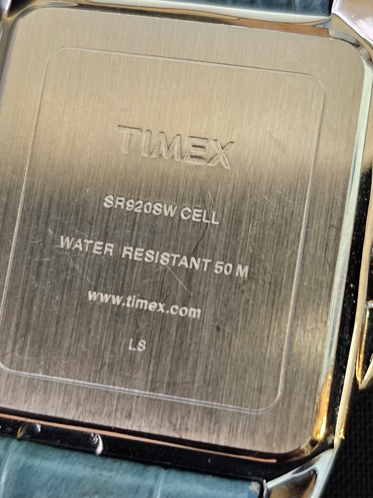 Timex - Black face, Silver bezel, Light blue band